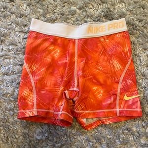 kids orange nike pros